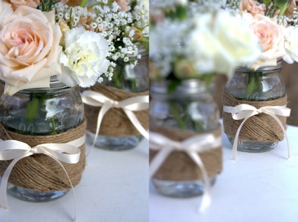 Mason jars wrapped in twine and filled with pretty flowers are a lovely 