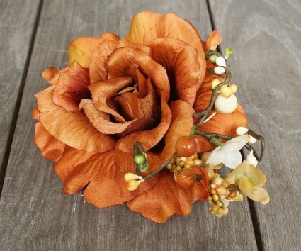 This gorgeous copper rose doubles as a hair clip or a brooch and would be